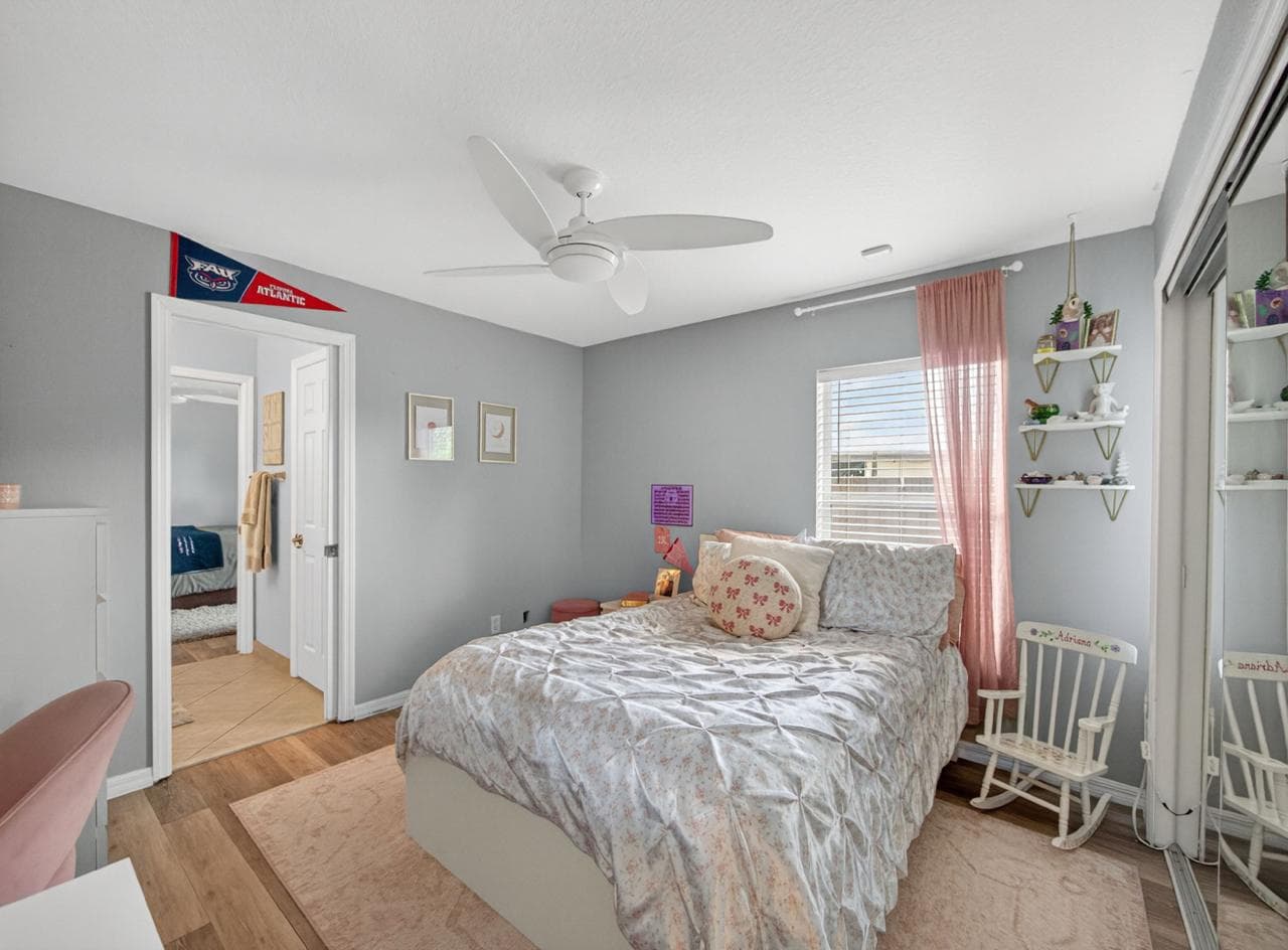 Bedroom with pink curtains