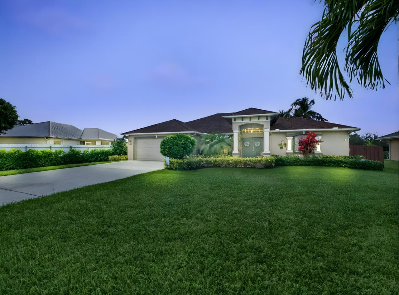 The Gatun House exterior at dusk