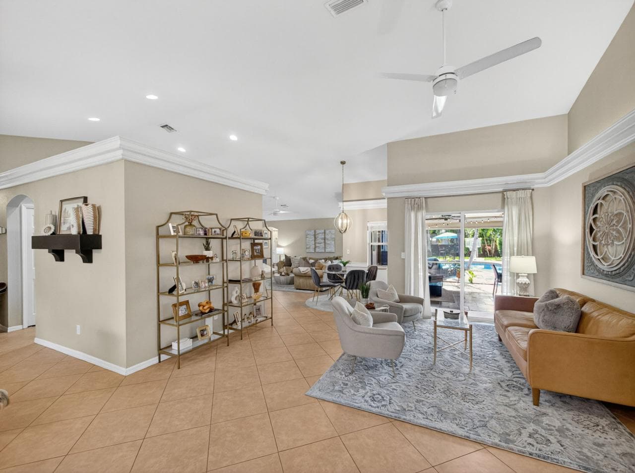 Spacious living room with pool access